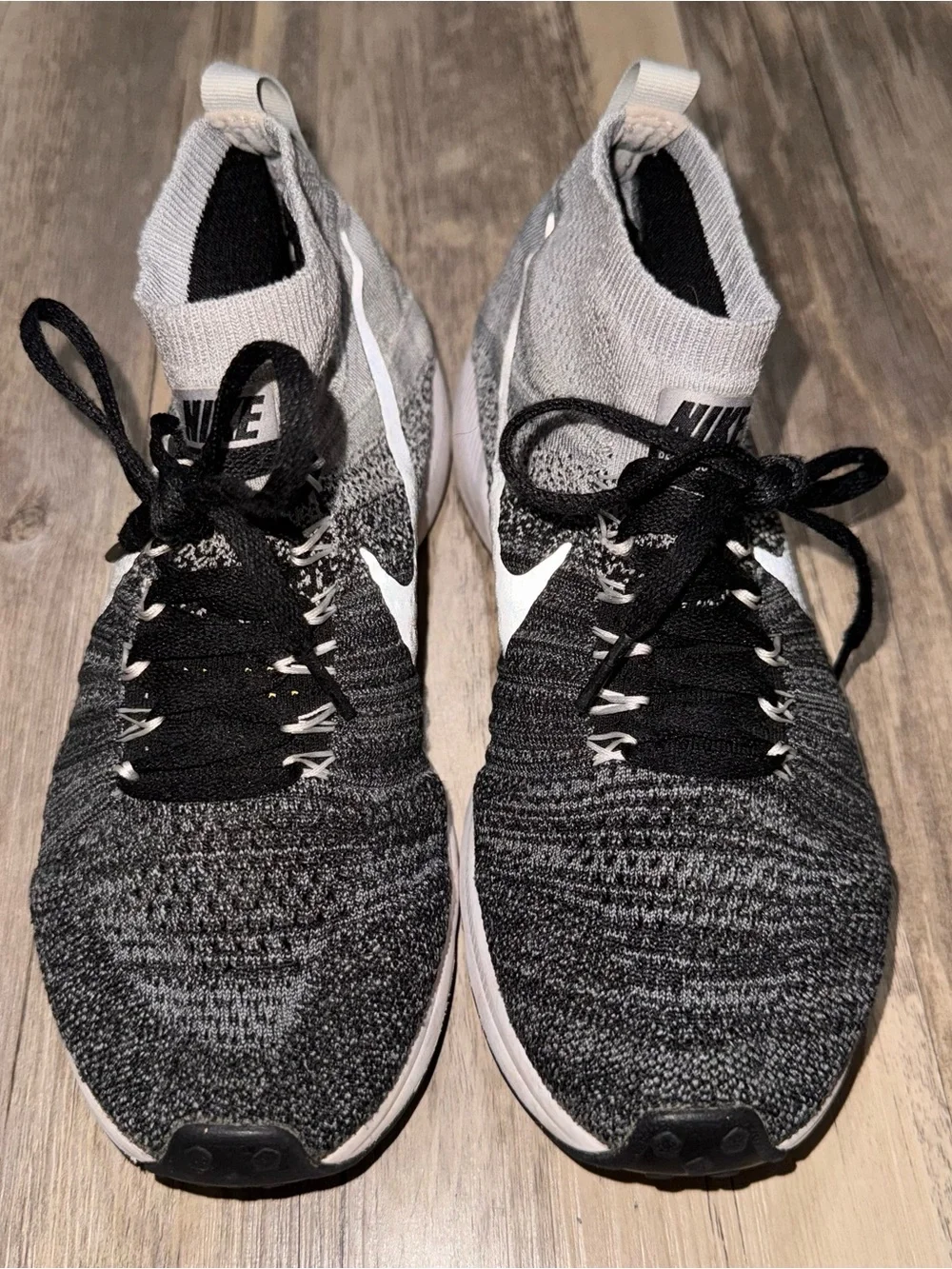 Nike Kids Black and Gray Flyknit High-Top Sneakers with White Swoosh
